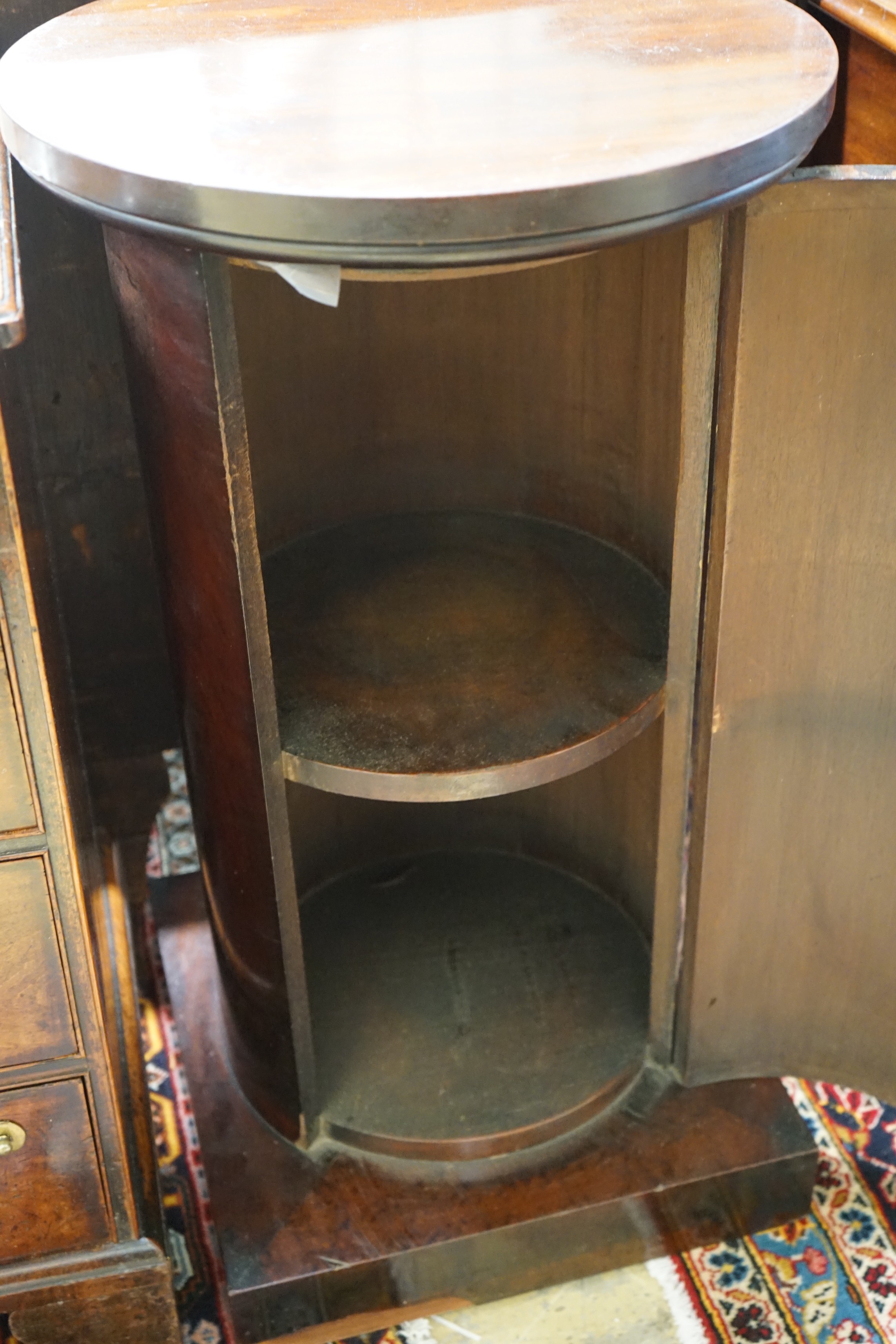 A Victorian circular mahogany pedestal cupboard, diameter 43cm, height 78cm